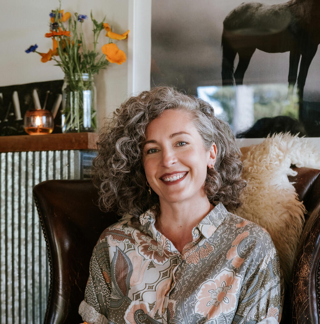 Kimberley Bartlett, counsellor and sleep therapist at Present State, holding a notebook and pen